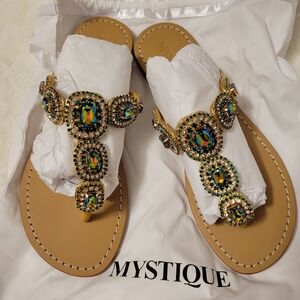 Mystique Boutique Tan T-Strap Sandals with Iridescent Gem Accents
